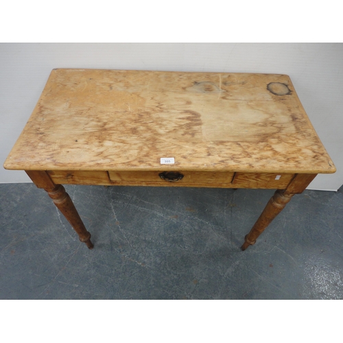 305 - Late 19th century pine writing table with single drawer.