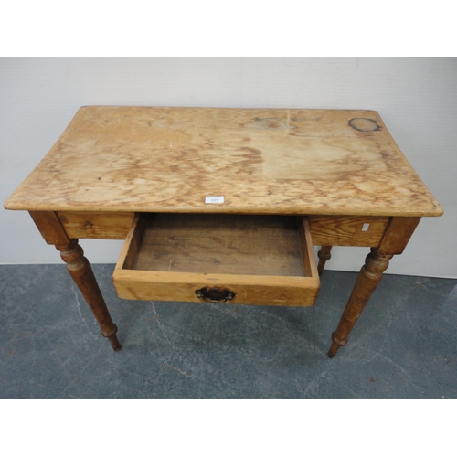 305 - Late 19th century pine writing table with single drawer.