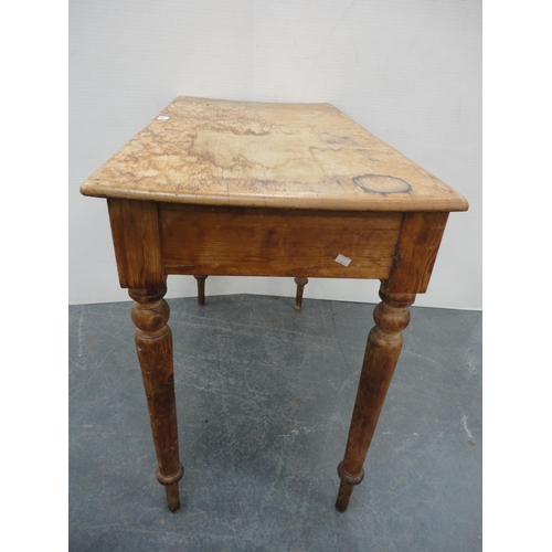 305 - Late 19th century pine writing table with single drawer.