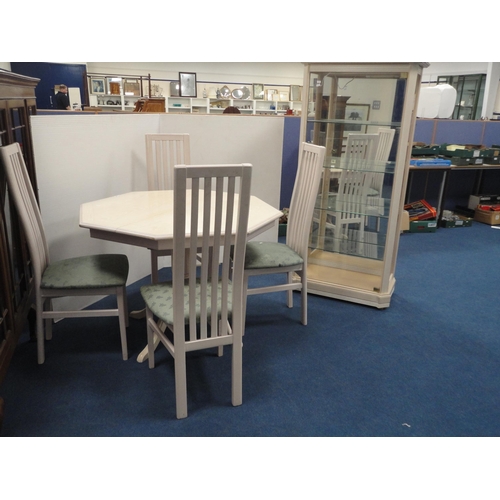 316 - Contemporary dining room suite comprising a display cabinet, octagonal table and four chairs.  ... 