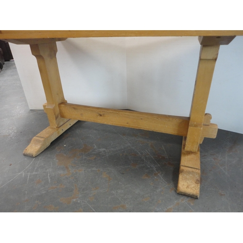 319 - Pine trestle table.