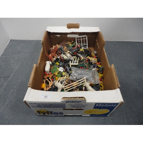 32 - Carton containing plastic farm animals, toy soldiers etc.