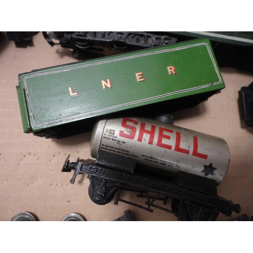 34 - Three cartons containing 00 gauge tankers, coaches, 47606 locomotive, rolling stock, parts etc.