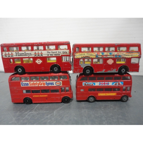 35 - Carton containing assorted diecast models to include Dinky examples, double decker buses, vans etc.,... 