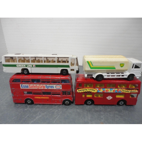 35 - Carton containing assorted diecast models to include Dinky examples, double decker buses, vans etc.,... 