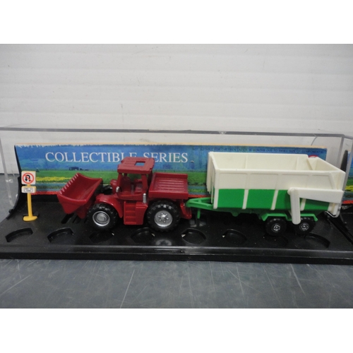 35 - Carton containing assorted diecast models to include Dinky examples, double decker buses, vans etc.,... 