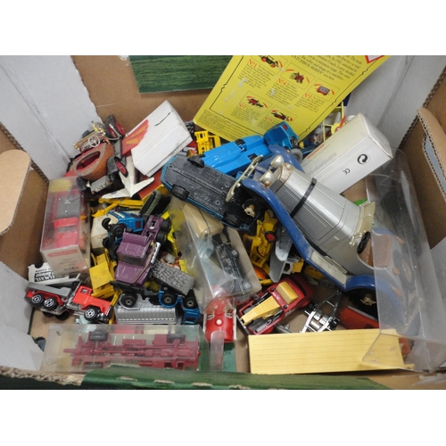 38 - Carton containing assorted vintage and later playworn diecast models to include Corgi examples, some... 