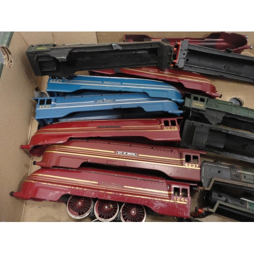 39 - Four cartons containing 00 gauge coach and rolling stock parts, wagons, bogeys etc.