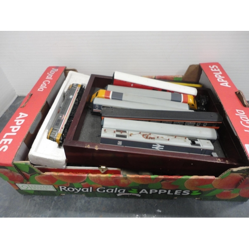 40 - Three cartons containing 00 gauge locomotive parts, coach parts, track etc.