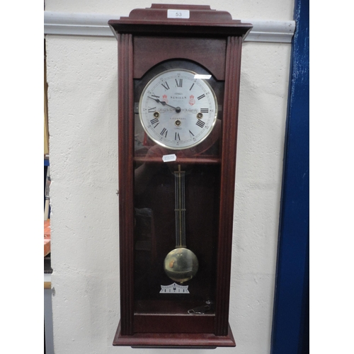 53 - Modern wall clock by Sewells of Liverpool with triple train dial.