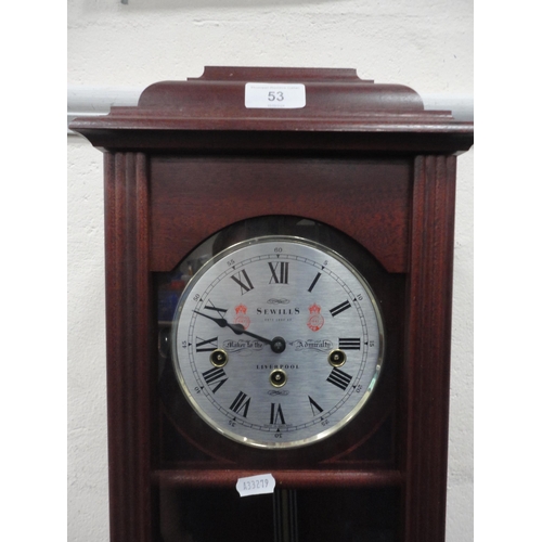 53 - Modern wall clock by Sewells of Liverpool with triple train dial.