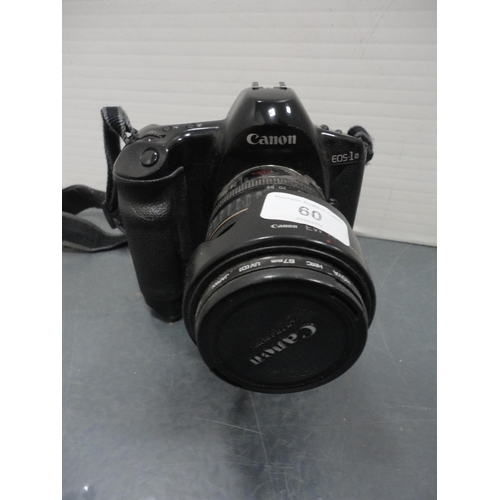 60 - Canon EOS-1 camera, with Canon lens attached, a Canon  ET-83 70-200mm lens, a box camera and accesso... 