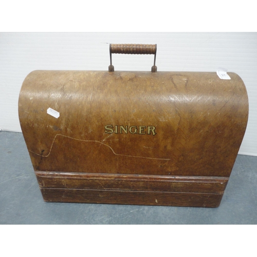 72 - Singer portable sewing machine in fitted case.