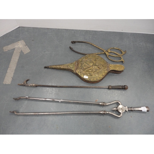 73 - Set of polished steel fire tongs, another set of tongs, poker and a set of brass-coated bellows.