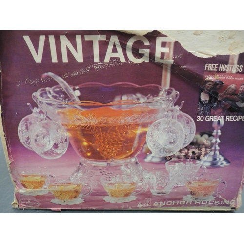 79 - Two boxed glass punch sets.