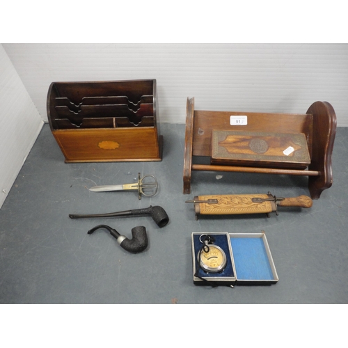 91 - Stationery rack containing pipes, book trough, brass-inlaid box, and a voltmeter etc.