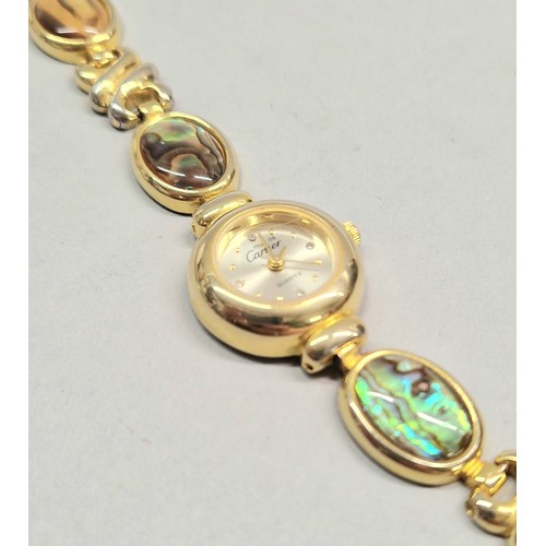 45 - Must de Cartier ladies gold toned abalone set wristwatch, a Venetian Murano glass watch face no stra... 