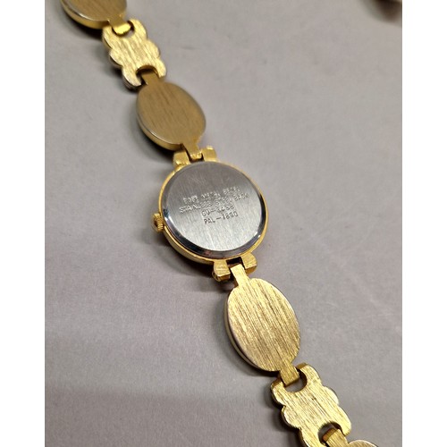 45 - Must de Cartier ladies gold toned abalone set wristwatch, a Venetian Murano glass watch face no stra... 