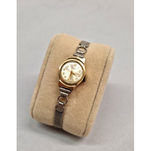 232 - Medana Lever ladies wristwatch 9ct gold with white metal strap