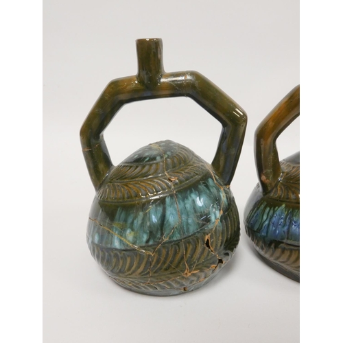 180 - Christopher Dresser (1834-1904). Pair of Linthorpe art pottery twin-handled Peruvian vessels, c1880,... 