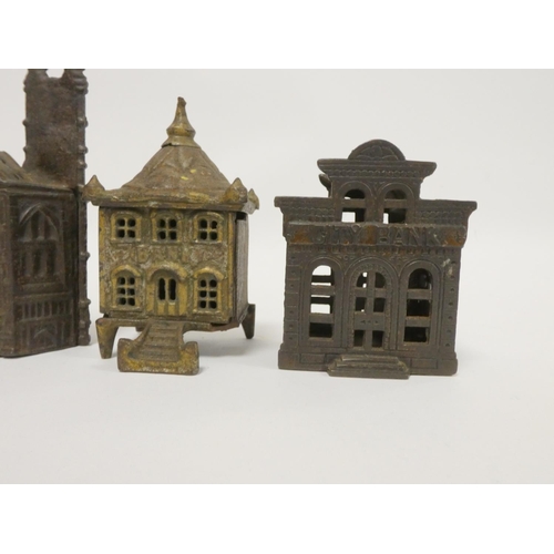 273 - Group of early 20th century cast iron novelty money boxes modelled after buildings. (4)