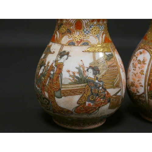 263 - Pair of Japanese Satsuma bud vases with panels depicting Geisha's within garden scenes surmounted by... 