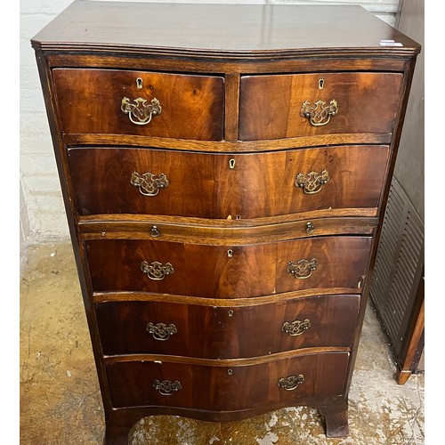 588 - Mahogany serpentine fronted two over four chest, 109cm high