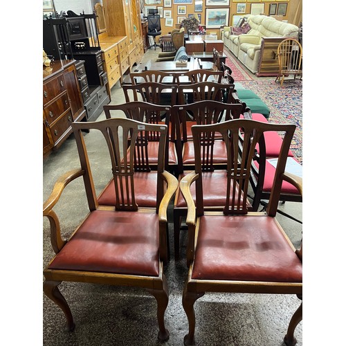 590 - Eight dining chairs in red leather upholstery (8)