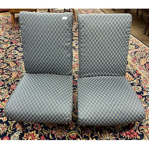 597 - Pair upholstered bedroom chairs on castors