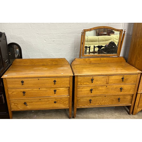 598 - Oak bedroom suite comprising mirrored wardrobe, two over two mirror back chest and three-drawer ches... 