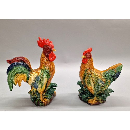 282 - Two pottery figures of a cockerel and hen