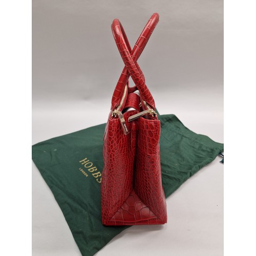 289 - Hobbs red leather large hand bag, with protective cloth bag.