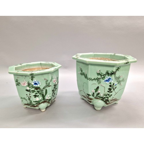 290 - Pair of graduated Oriental green glazed floral decorated jardinières.