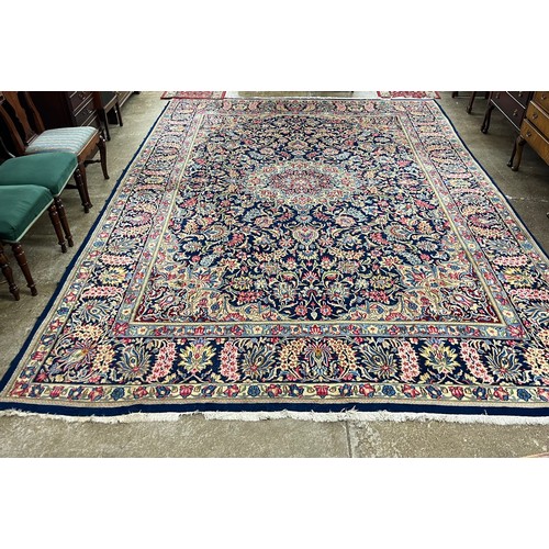 622 - Iranian woolen floor rug, made in Kerman, approx. 400cm x 300cm