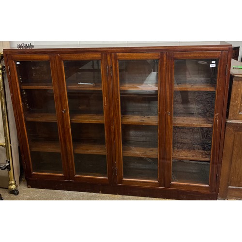 650 - Large mahogany glazed bookcase, H 138cm, W 182cm, D 28cm