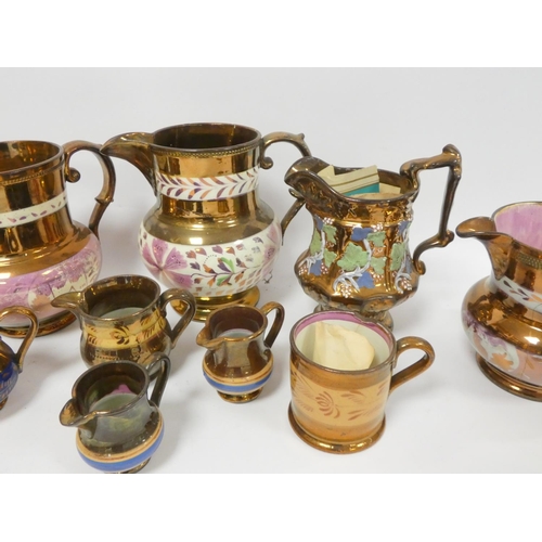 63 - Group of 19th century lustre jugs, various graduated sizes and styles, largest 17cm. (11)