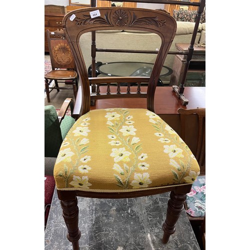 664 - Carved mahogany chair with floral upholstery, raised on turned legs 