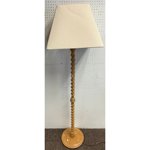 576 - Turned wood column standard lamp and shade