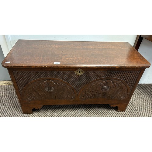 583 - Carved oak coffer, 98cm diameter