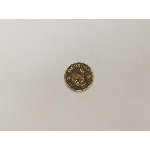 123 - Small gold 0.3gram South African 14ct gold coin.