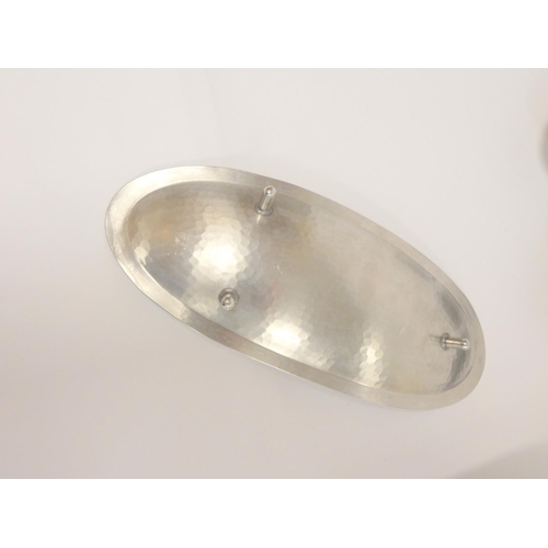 126 - Group of 1960s Lakeland Rural Industries (L.R.I), Borrowdale planished stainless steel oval side dis... 