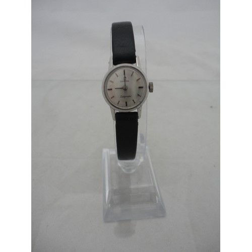 223 - Omega Ladymatic lady's watch with silvered dial and leather strap.