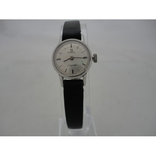 223 - Omega Ladymatic lady's watch with silvered dial and leather strap.