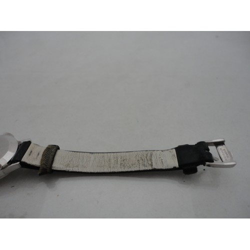 223 - Omega Ladymatic lady's watch with silvered dial and leather strap.