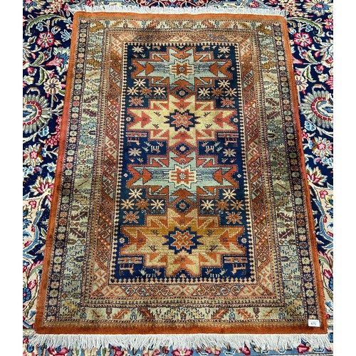 675 - Eastern-style floor rug, 136cm x 98cm