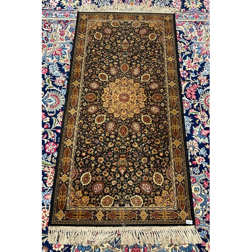 679 - Black & beige Eastern-style rug, 177cm x 92cm