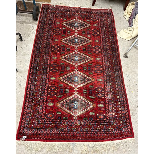 681 - Large Eastern-style floor rug, 204cm x 128cm