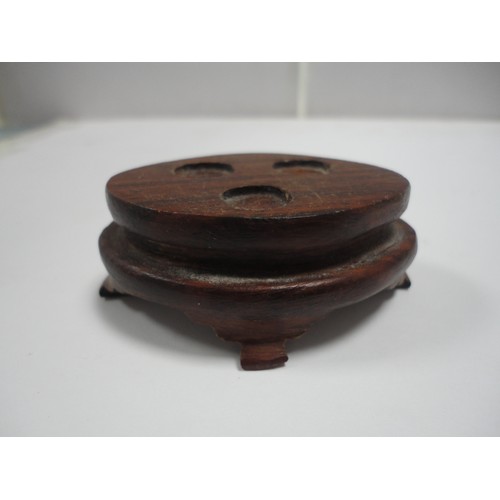 204 - Small Chinese-style jade-coloured censer and cover on stand, and a similar jade-coloured temple dog.... 