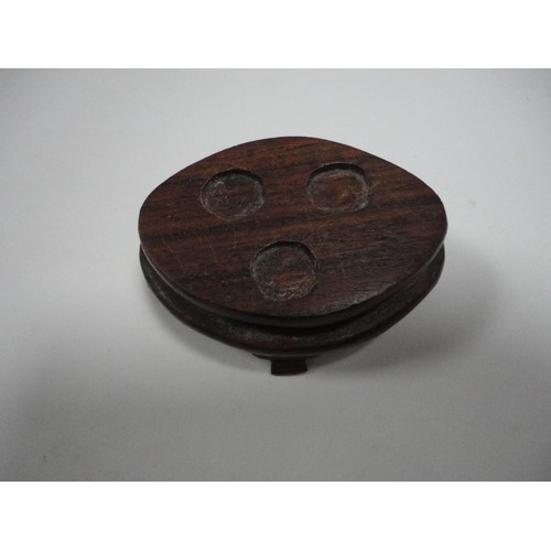 204 - Small Chinese-style jade-coloured censer and cover on stand, and a similar jade-coloured temple dog.... 