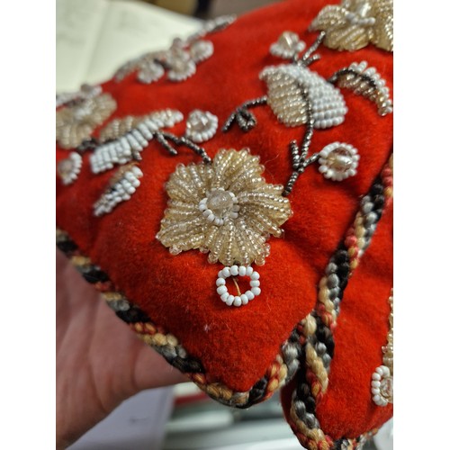 205 - Antique felt tea cosy embroidered with floral beadwork